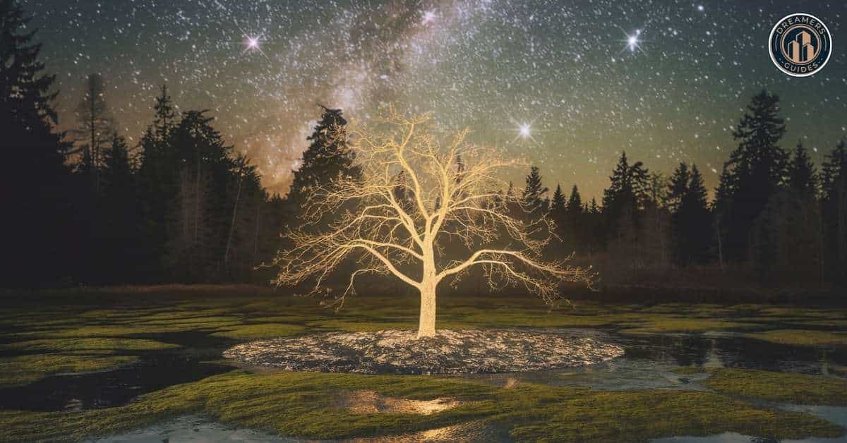 Glowing ash tree growing from ashes under a starry sky, representing the transformative spiritual power of the name Ashley.